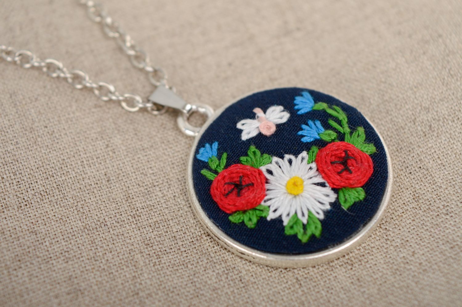 Handmade embroidered pendant with flowers photo 4