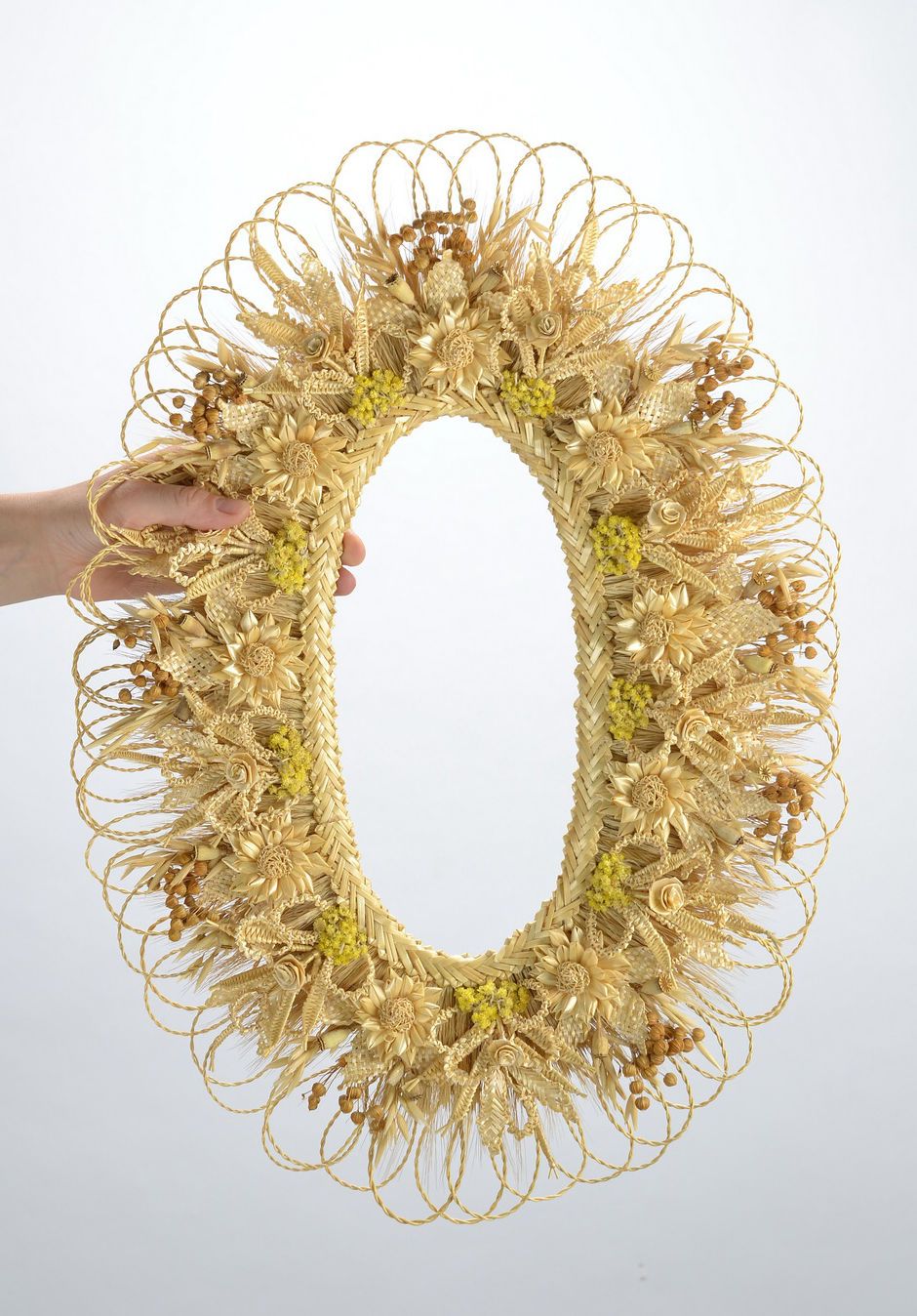Oval family amulet made of straw photo 2