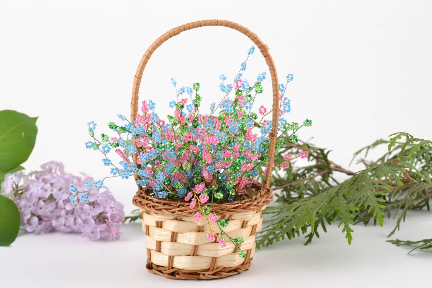 Small basket with handmade bright colorful artificial flowers woven of beads photo 1
