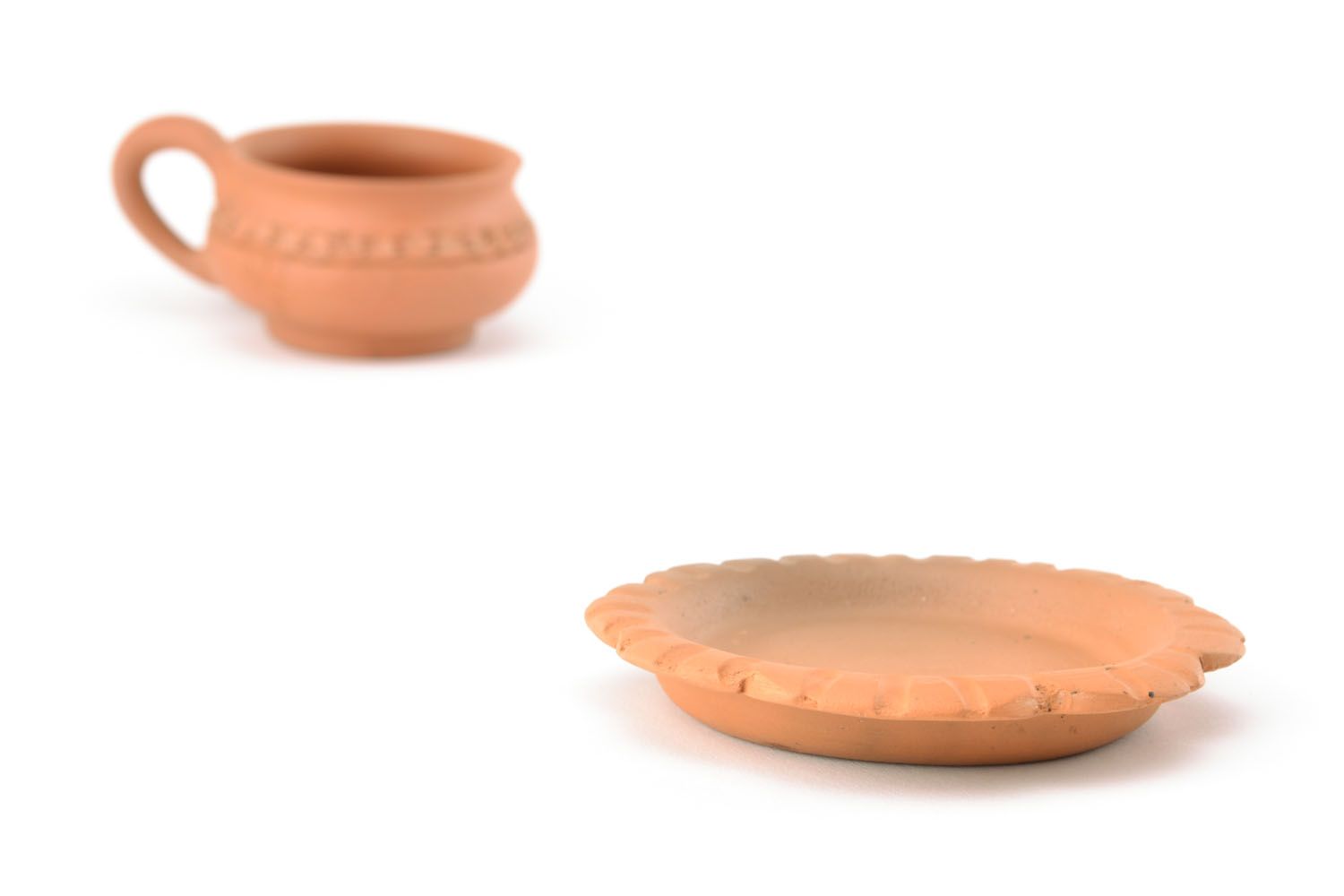 Clay saucer for a cup photo 1