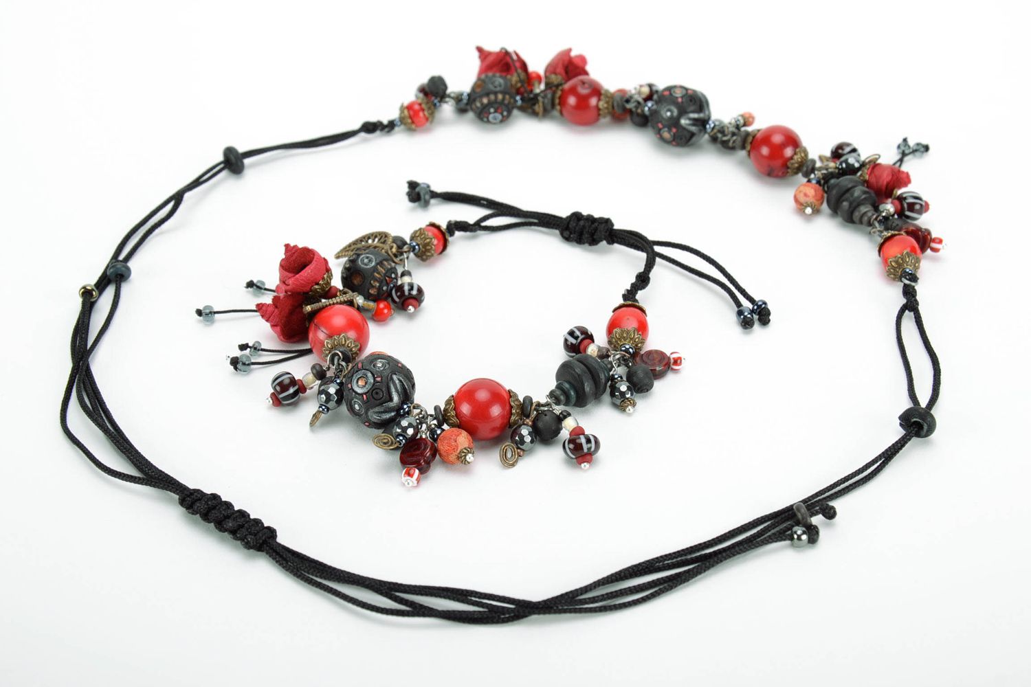 Bracelet made of black smoked ceramics with pendants  photo 4