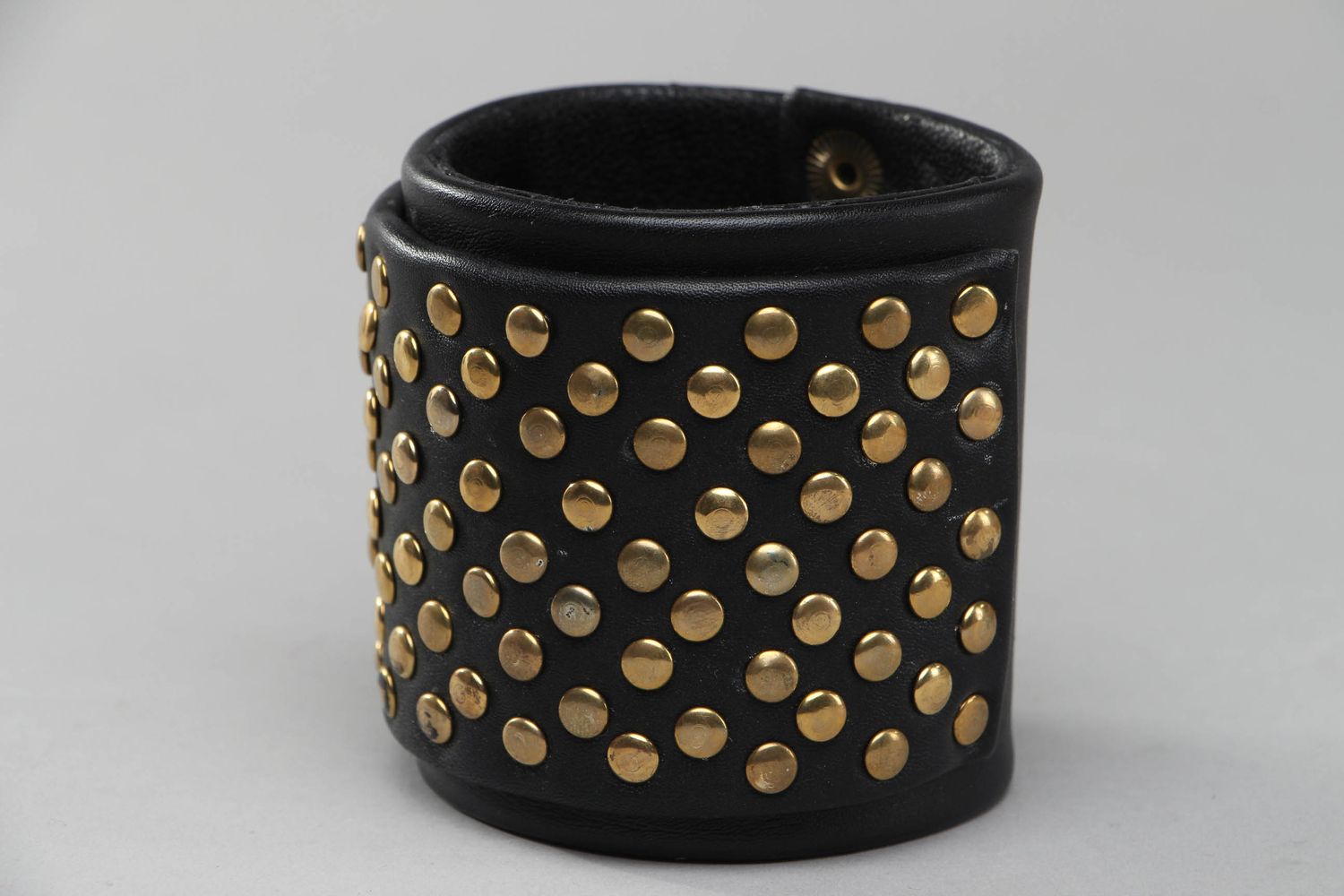 Leather bracelet with metal rivets photo 1