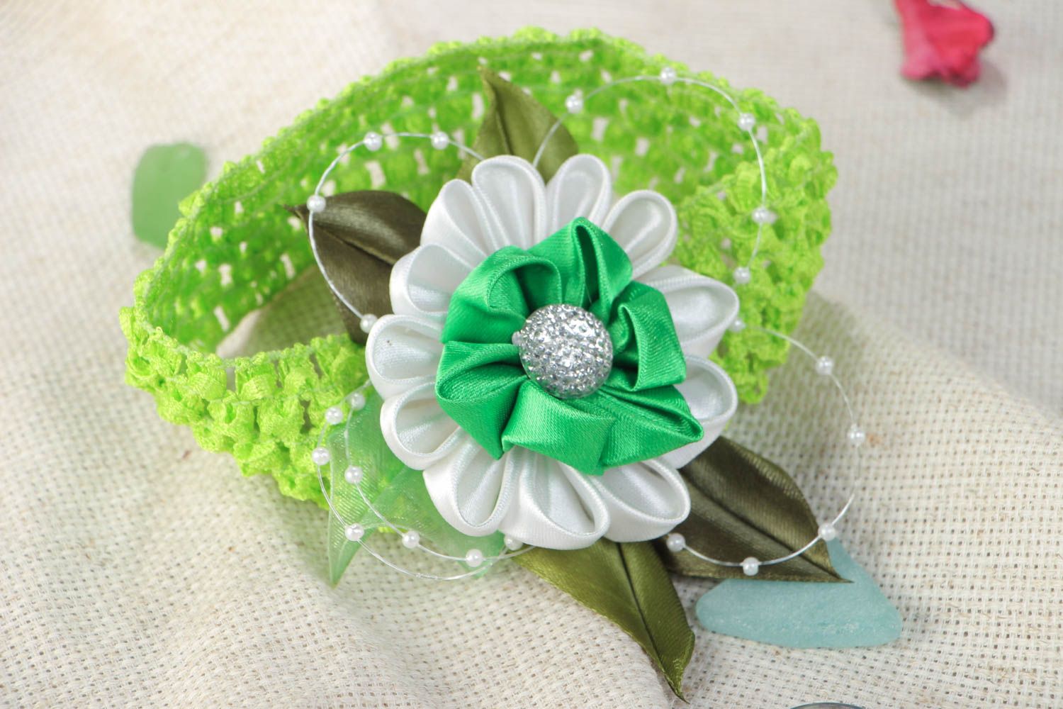 Handmade light green decorative headband with stretch basis and kanzashi flower photo 1