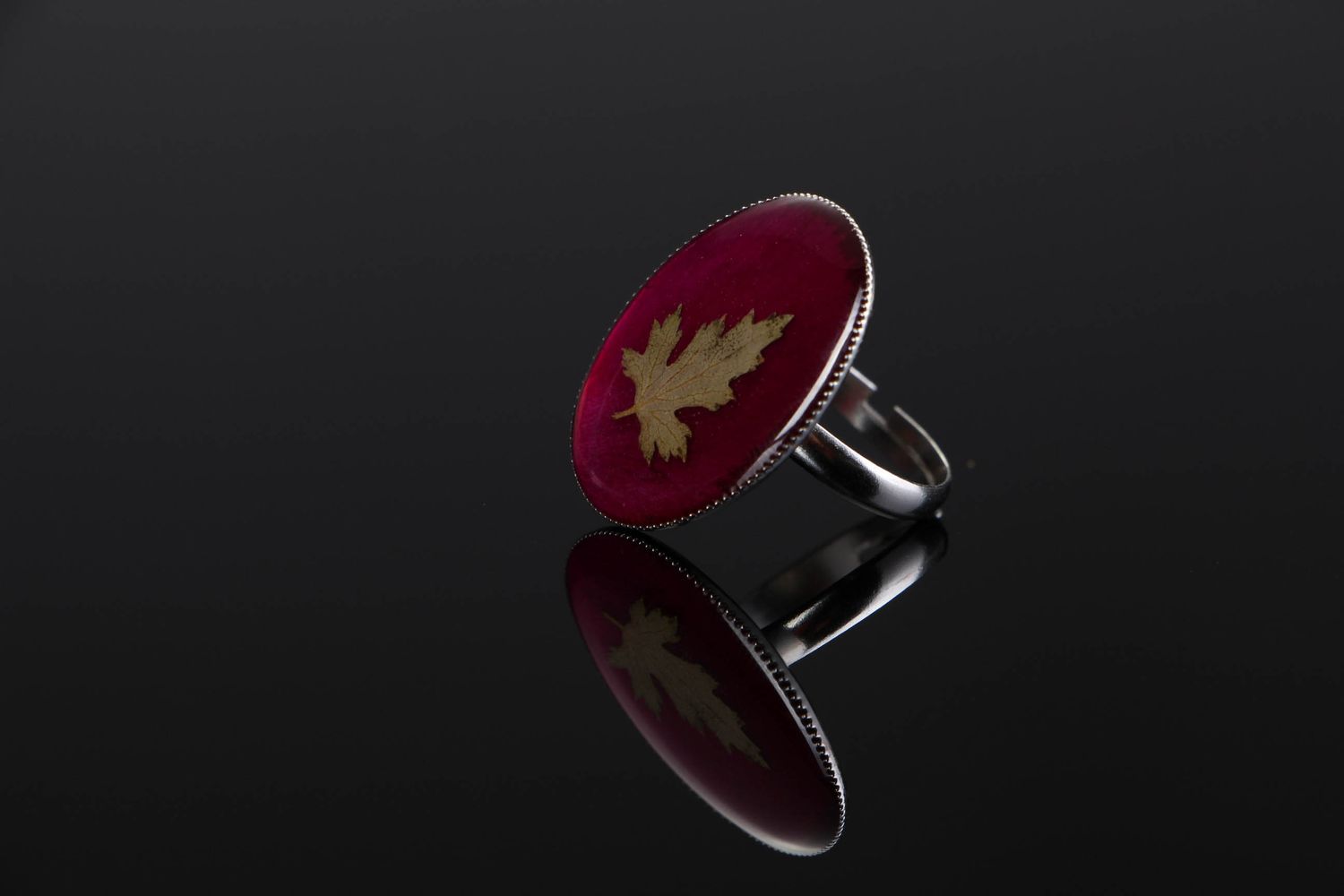 Ring made of epoxy with peony leaf photo 1