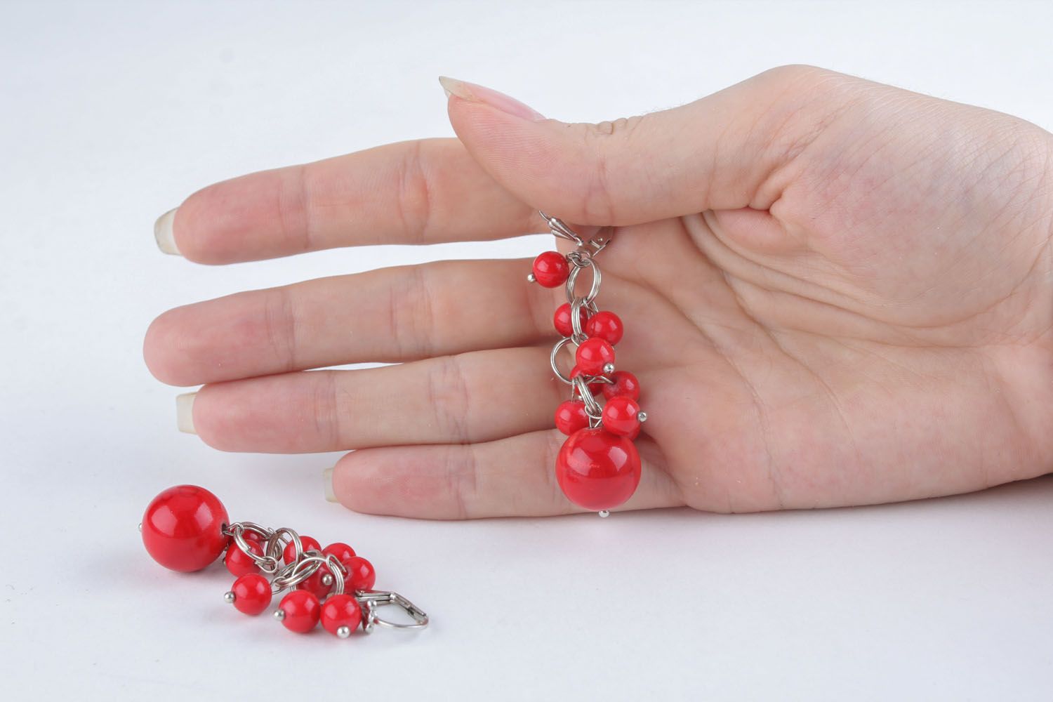 Long earrings with natural coral photo 5