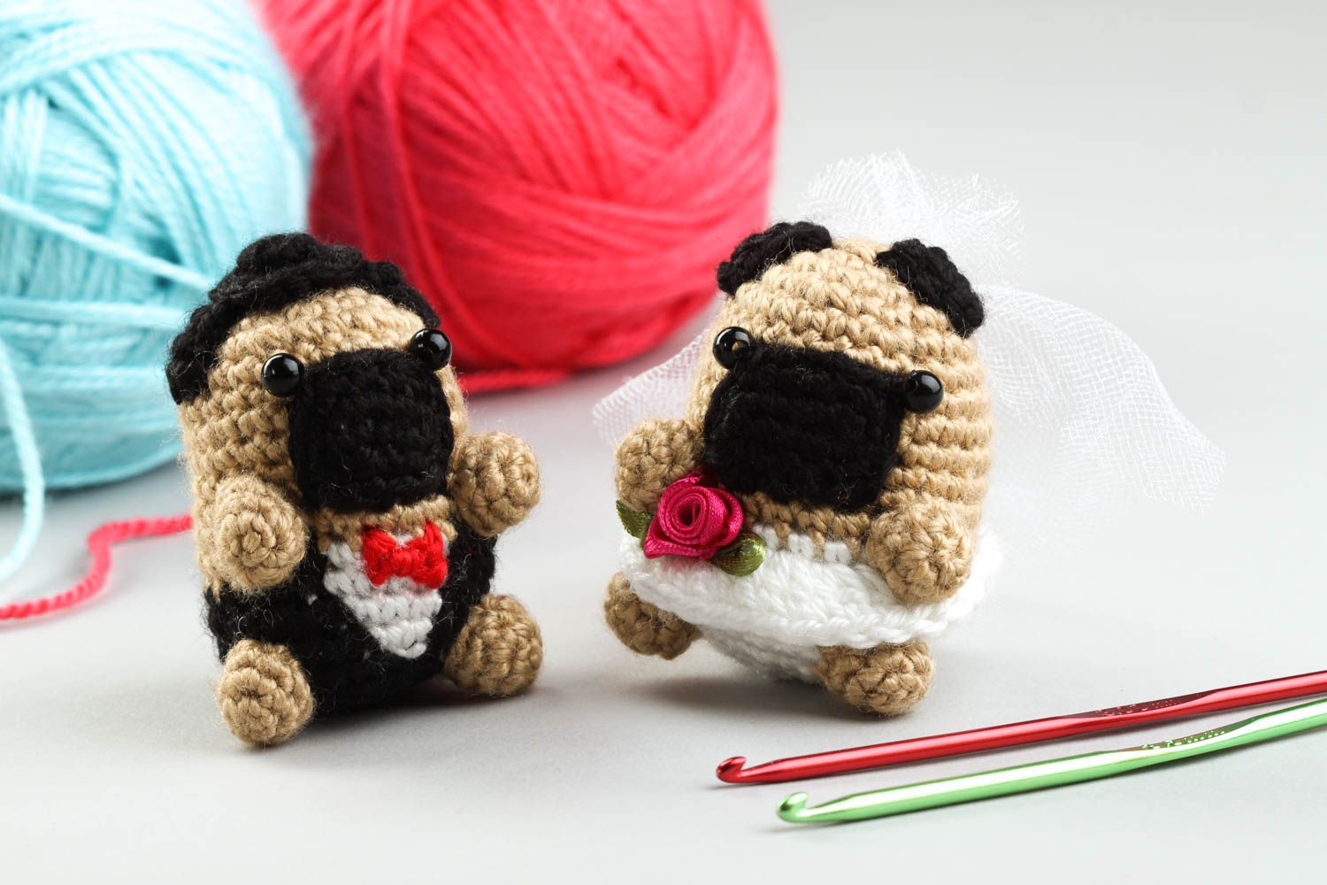 Set of two knitted stuffed pugs. Boy and girl photo 1