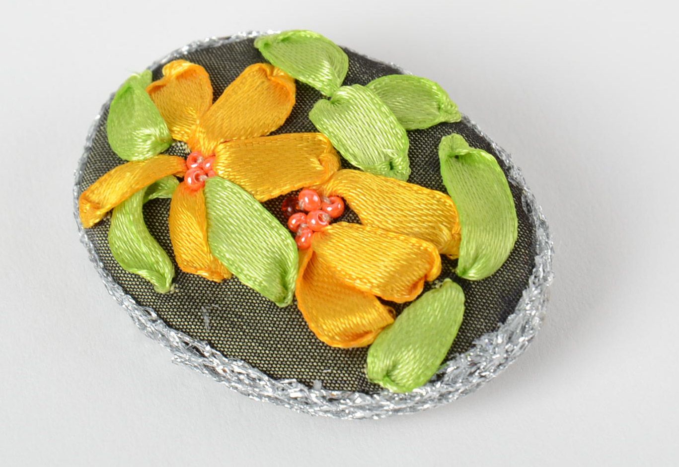 Handmade textile brooch with yellow flowers embroidered using satin ribbons photo 2