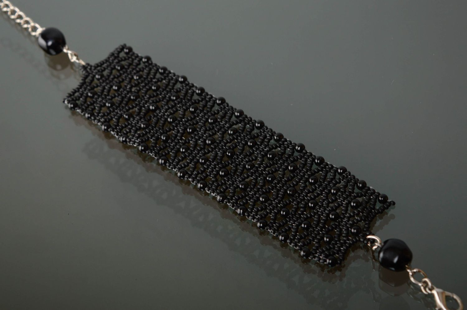 Wide lacy beaded bracelet of black color photo 1