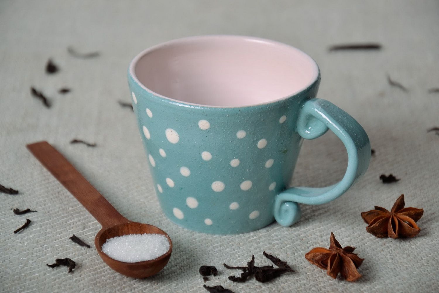 Clay glazed drinking cup in blue color and white dots with handle for a girl photo 1