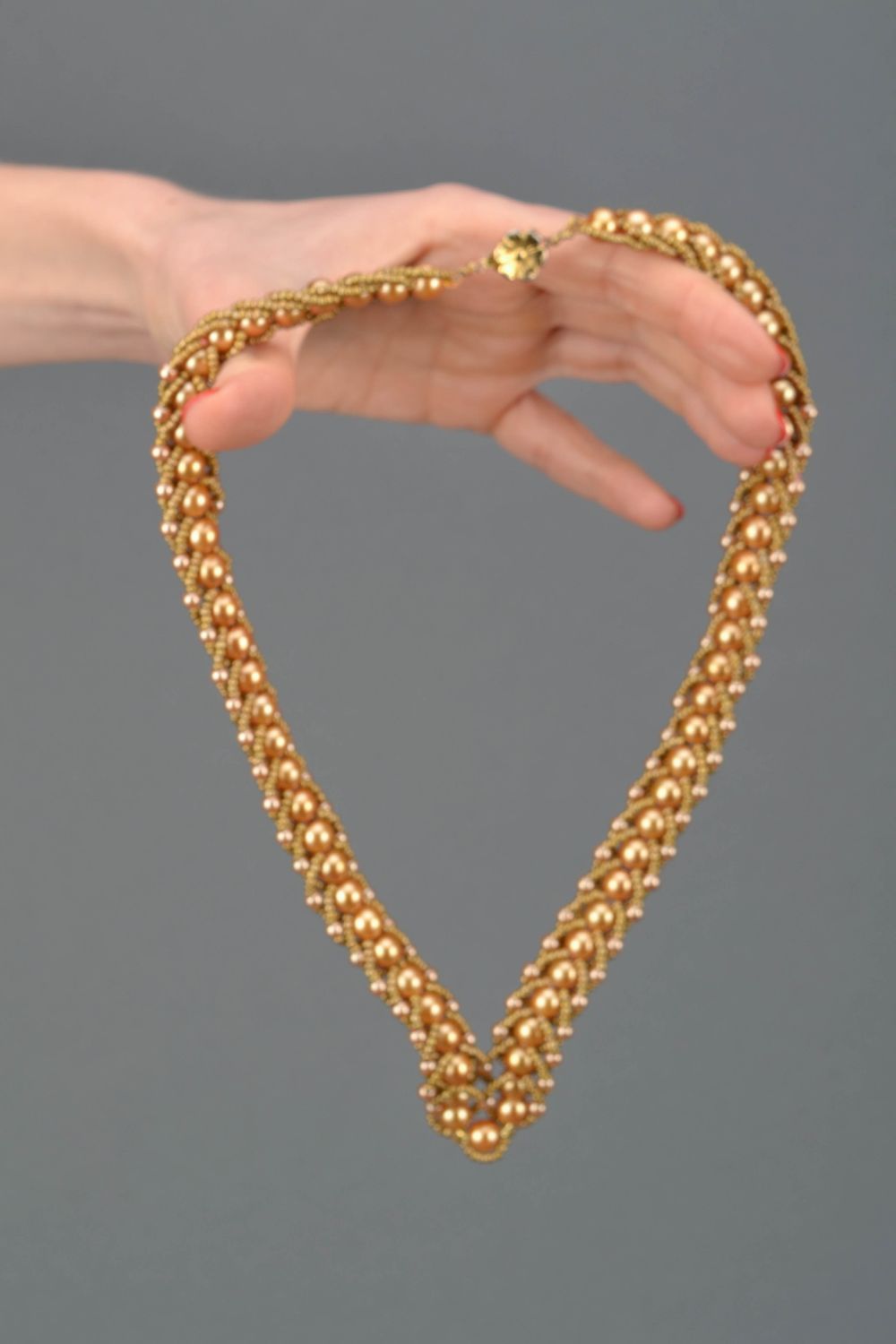 Goldfarbenes Collier aus Glasperlen handmade foto 2