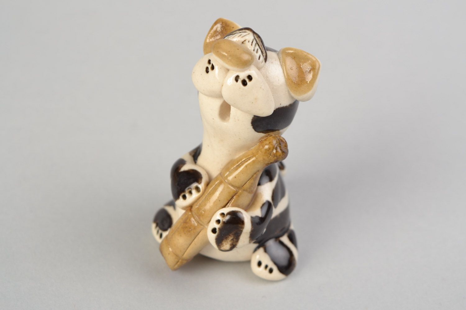 Handmade designer ceramic figurine of kitten with sausage painted with glaze photo 1