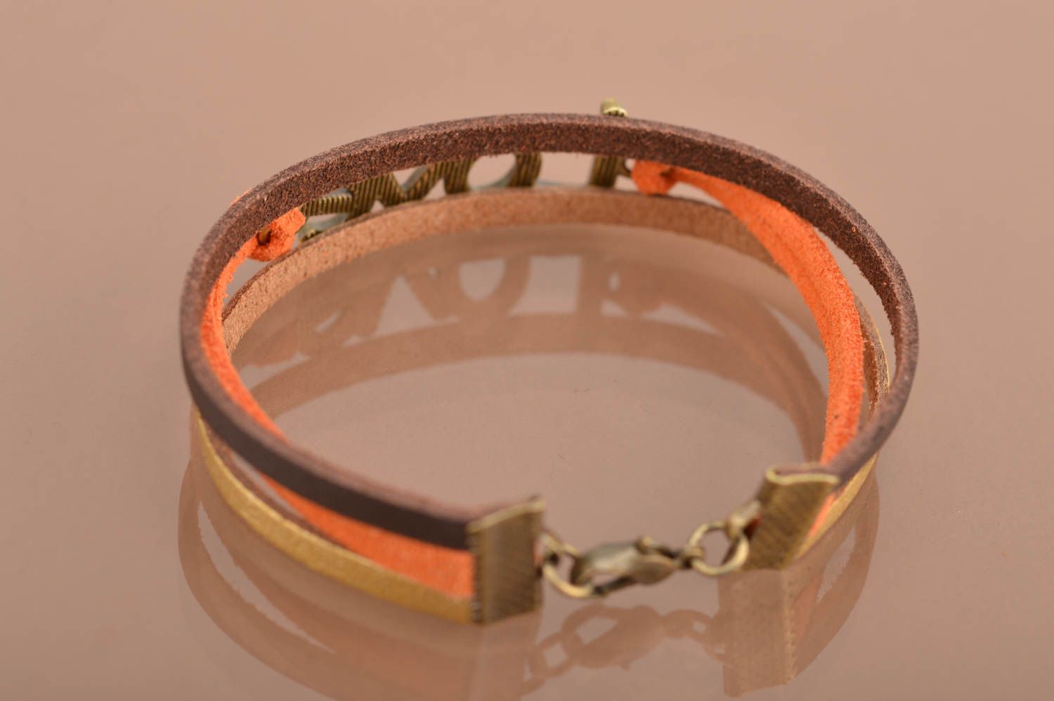 Unusual beautiful orange bracelet woven of suede cords with inserts Love photo 5
