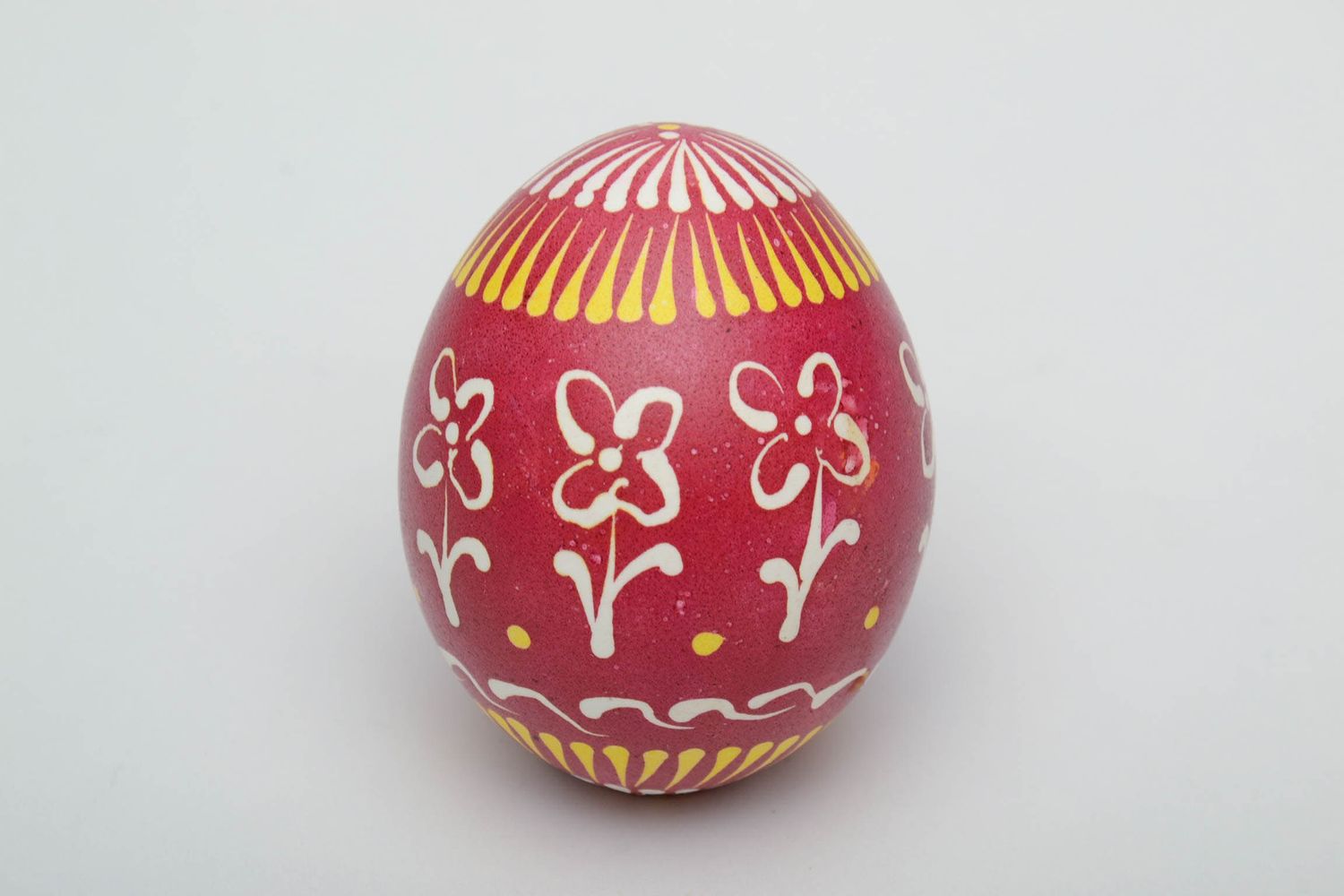 Painted egg in Lemkiv style of red color photo 2