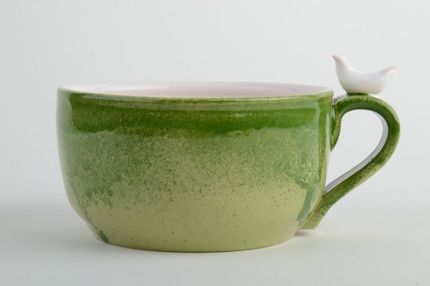 Light green porcelain drinking cup with handle and red heart on the bottom photo 2