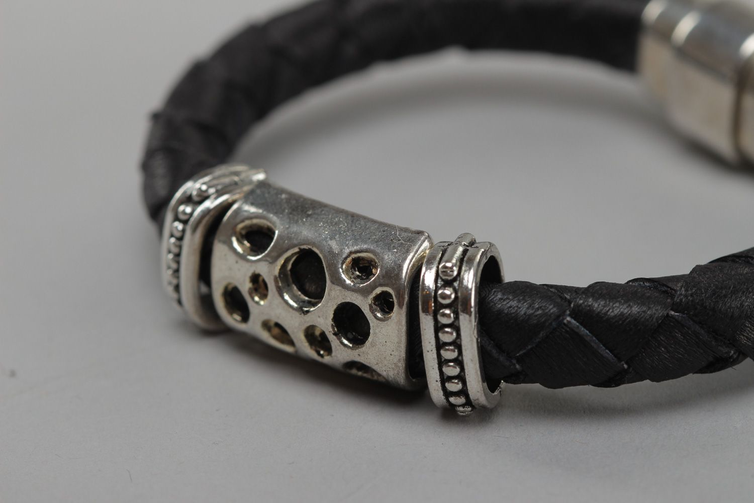 Handmade unisex genuine leather bracelet with metal charm photo 3