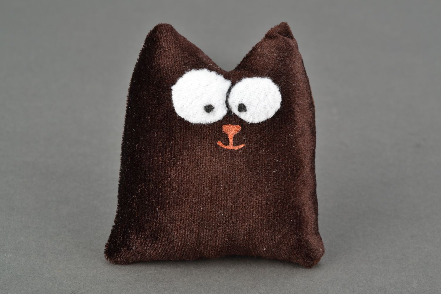 Brown soft toy cat photo 1