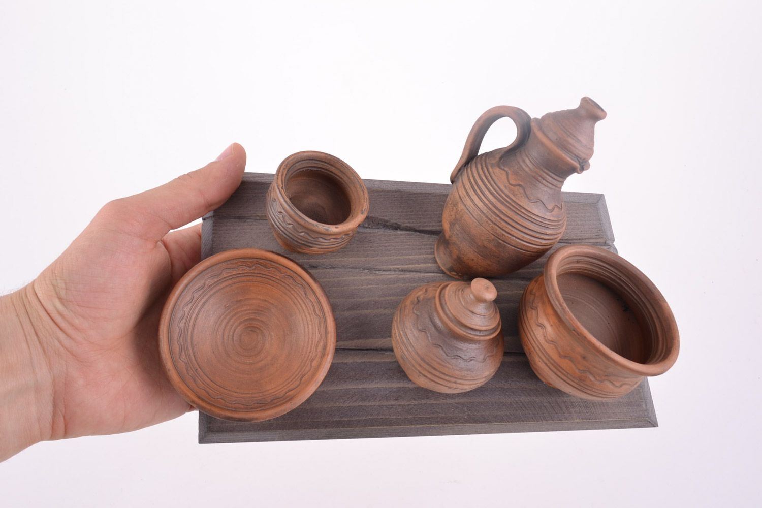 Handmade decorative wooden wall panel with volume ceramic dishes for kitchen photo 2