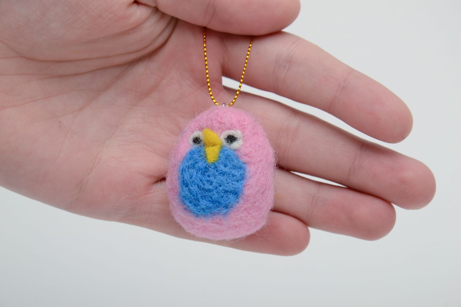 Felted wool toy bird with eyelet photo 5
