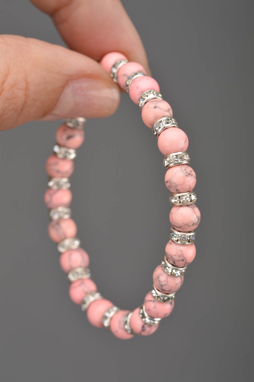 Unusual handmade designer women's elastic wrist bracelet with pink beads photo 2