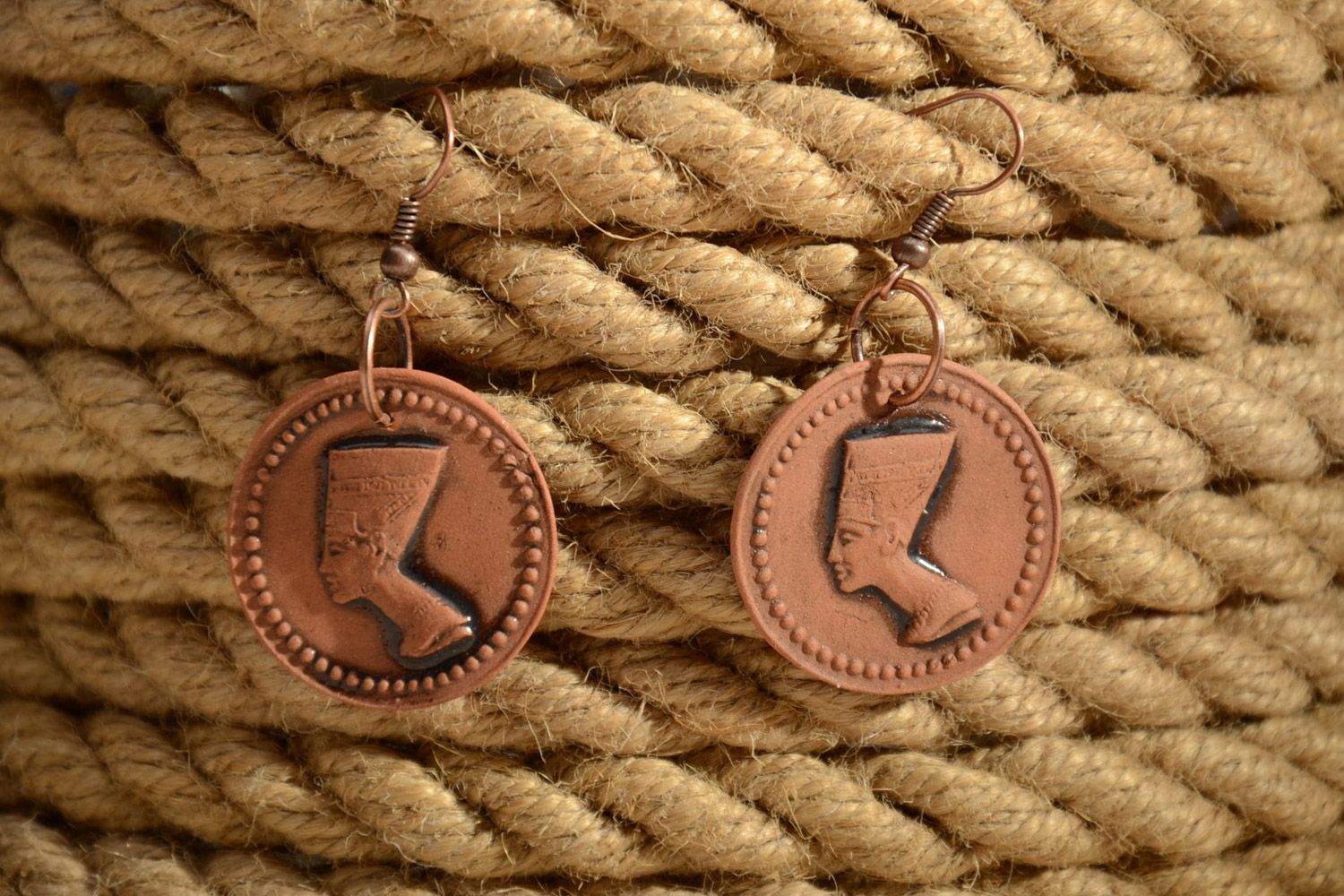 Women's round earrings hand made of brown clay with the image of Nefertiti photo 1