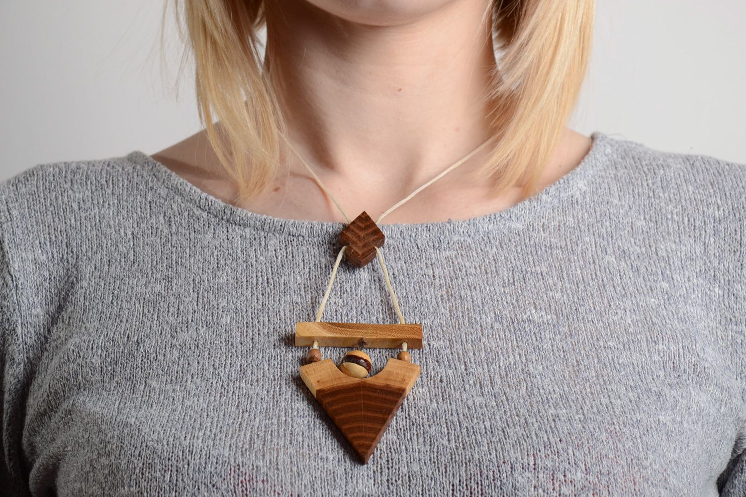 Handmade designer carved wooden neck pendant of triangle shape for women photo 2