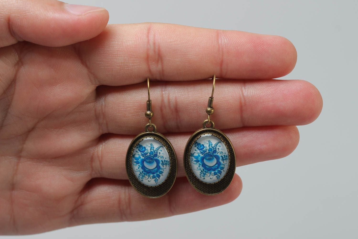 Handmade designer oval dangling earrings with metal basis and glass like glaze photo 5