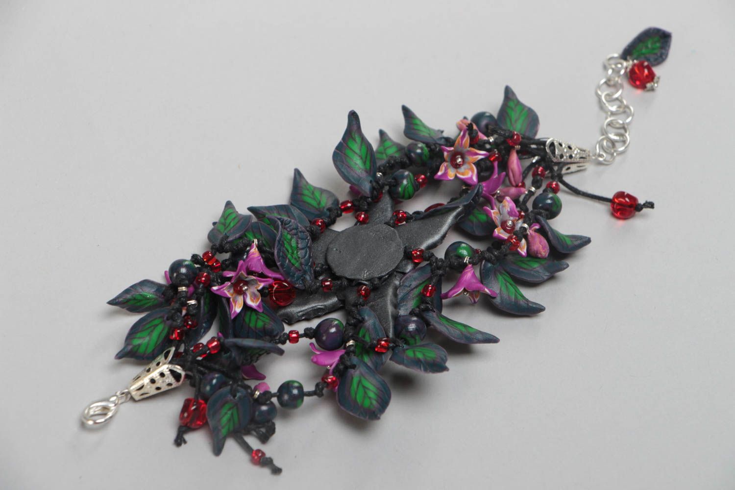 Handmade stylish bracelet made of polymer clay with black orchids on chain photo 5