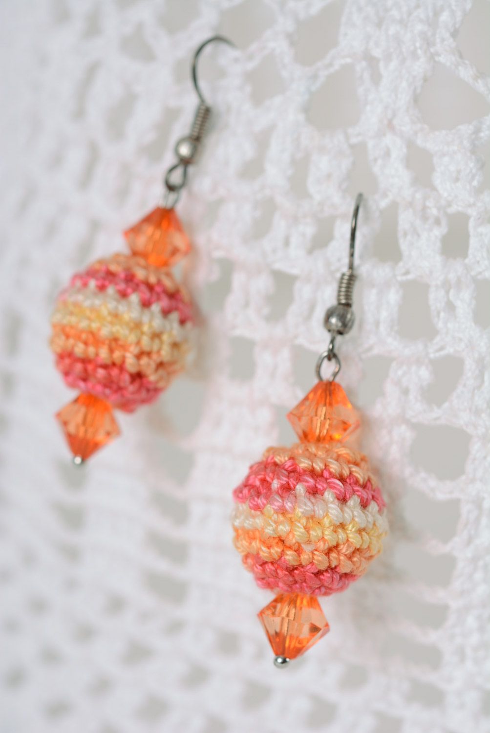 Handmade round dangle earrings crocheted of cotton threads in pink color palette photo 1