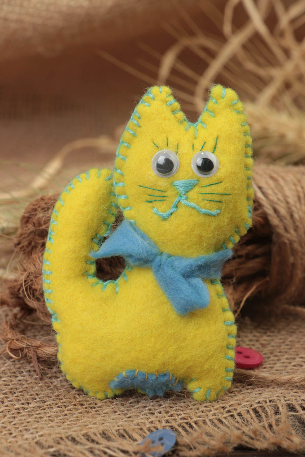 Handmade tiny felt soft toy designer yellow kitten with blue bow for kids photo 1