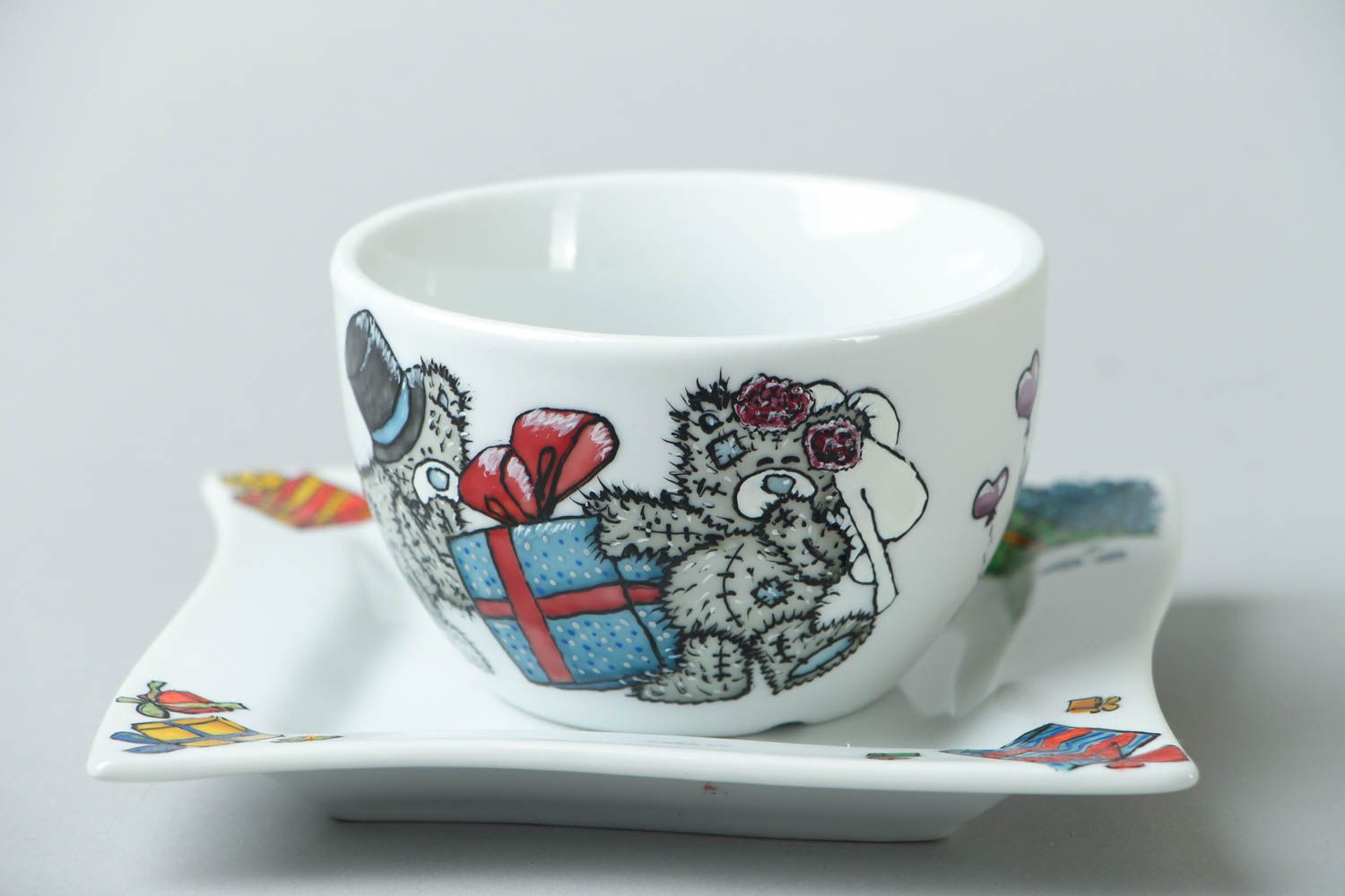 Handmade porcelain drinking cup with handle and teddy bears' pattern and square saucer photo 1