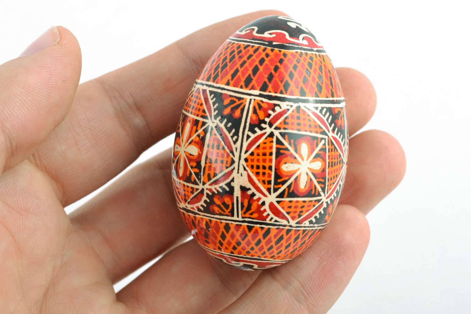Homemade ornamented chicken egg with wax painting Easter decoration for home photo 2