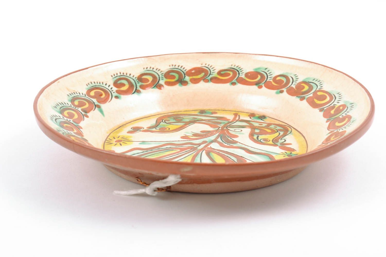 Декоративная тарелка глиняная расписанная вручную и покрытая глазурью небольшая фото 3