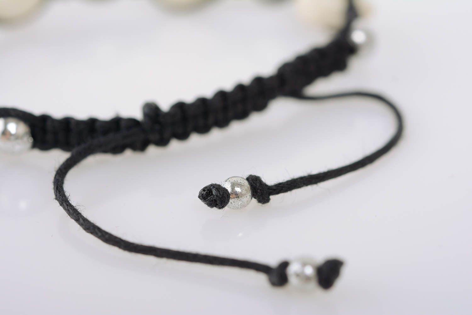 Beautiful unuusal designer handmade woven cord bracelet with beads and skulls photo 5