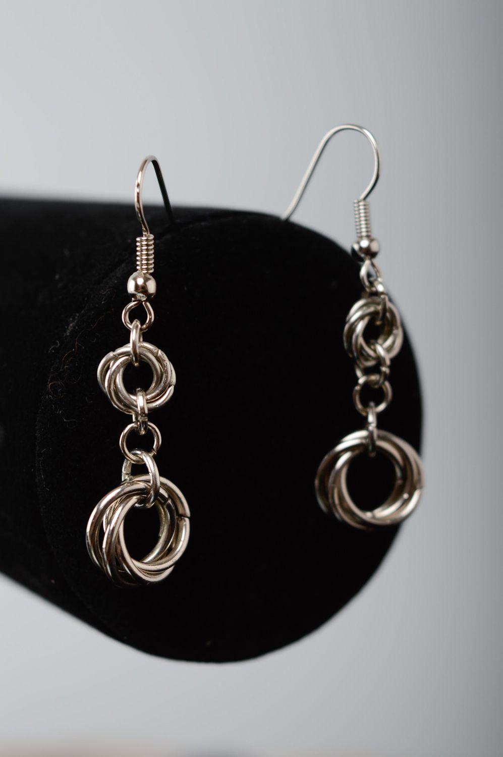 Handmade metal earrings created using chain armor weaving technique photo 1