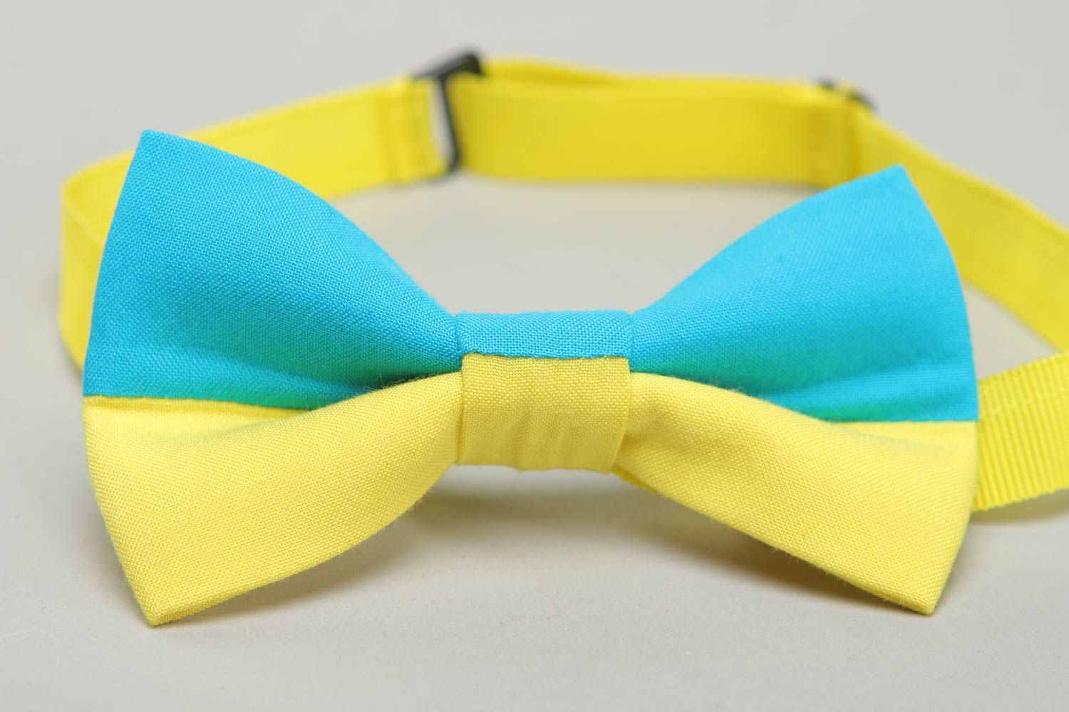 Fabric bow tie of yellow and blue colors photo 2