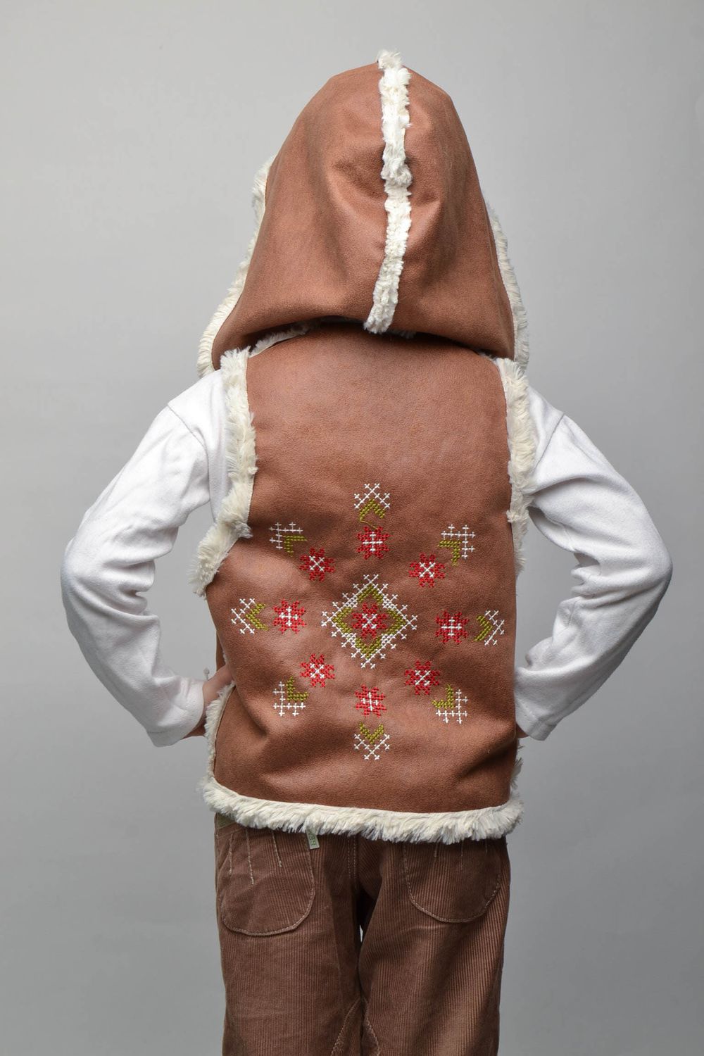 Artificial fur children's vest with hood and buttons photo 3