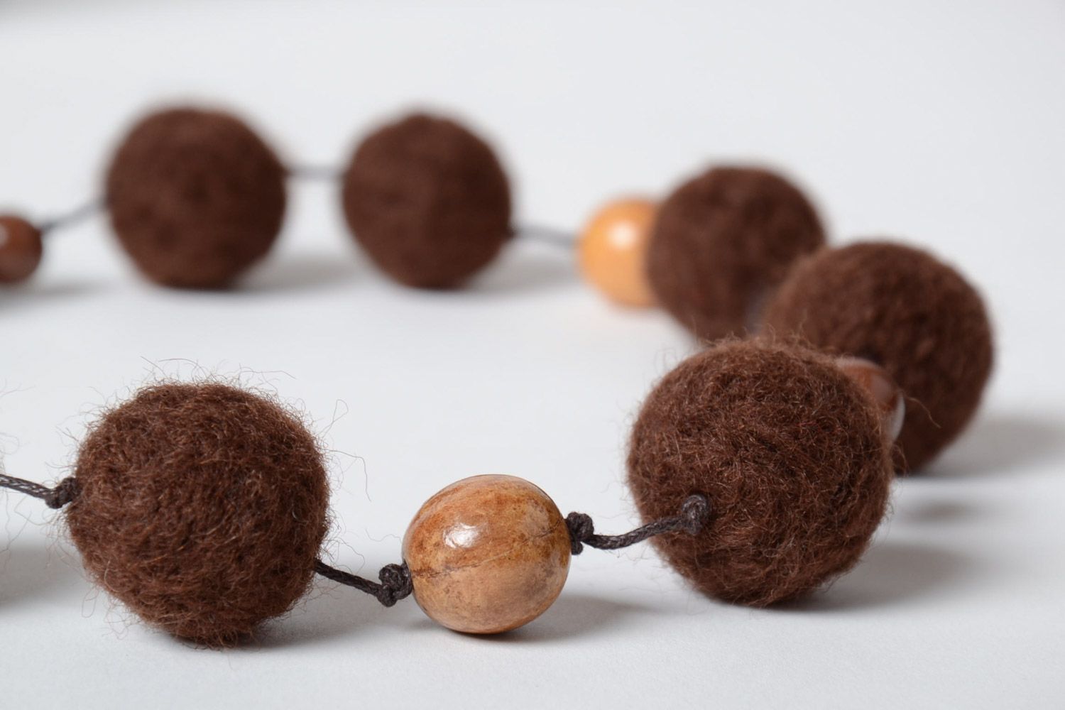 Brown handmade designer wool ball necklace created using needle felting technique photo 3