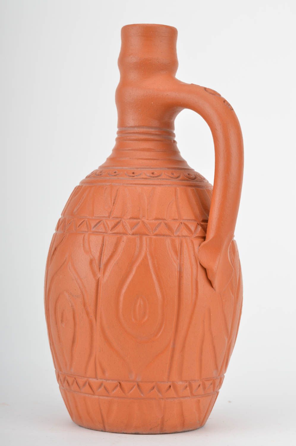 Botella de arcilla decorativa artesanal marrón clara con ornamento 330 ml foto 5