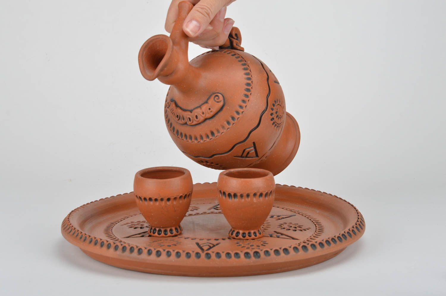 Conjunto de vajilla cerámica artesanal bandeja dos copas de 50 ml y jarro  foto 3