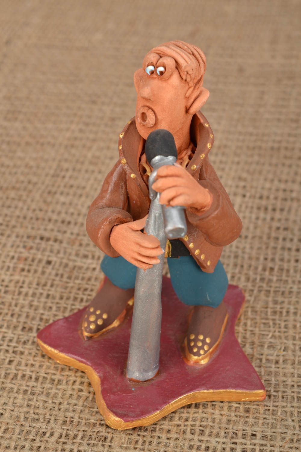 Ceramic figurine with painting Singer photo 1