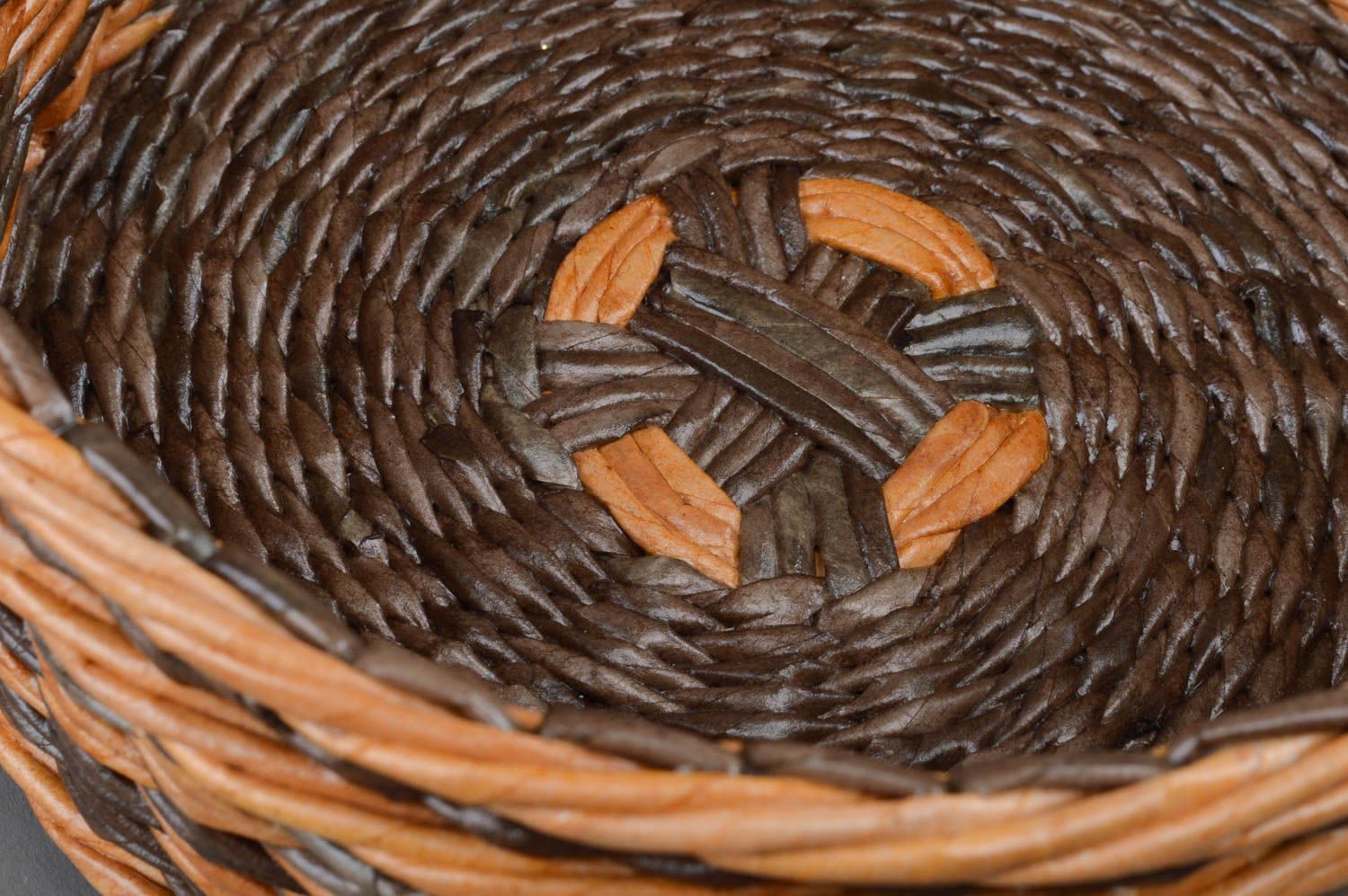 Handmade decorative round two colored brown basket woven of paper tubes photo 2