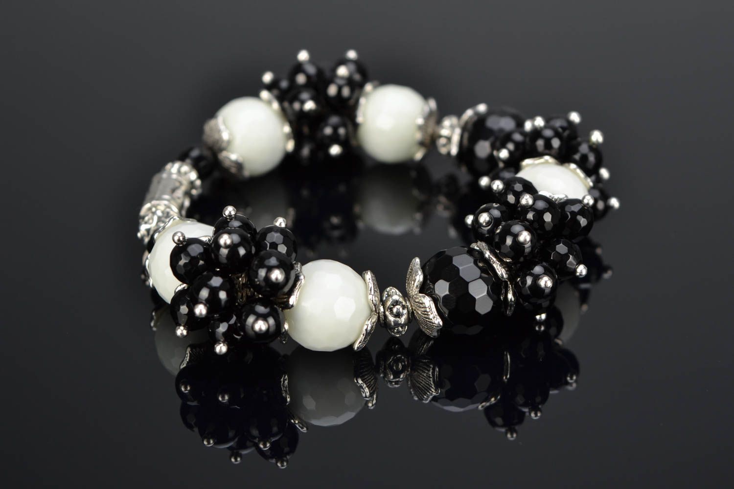 Black and white bracelet with natural stone photo 1