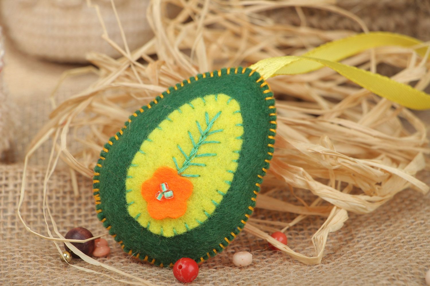 Handmade felt soft interior pendant Easter egg of green and orange colors photo 1