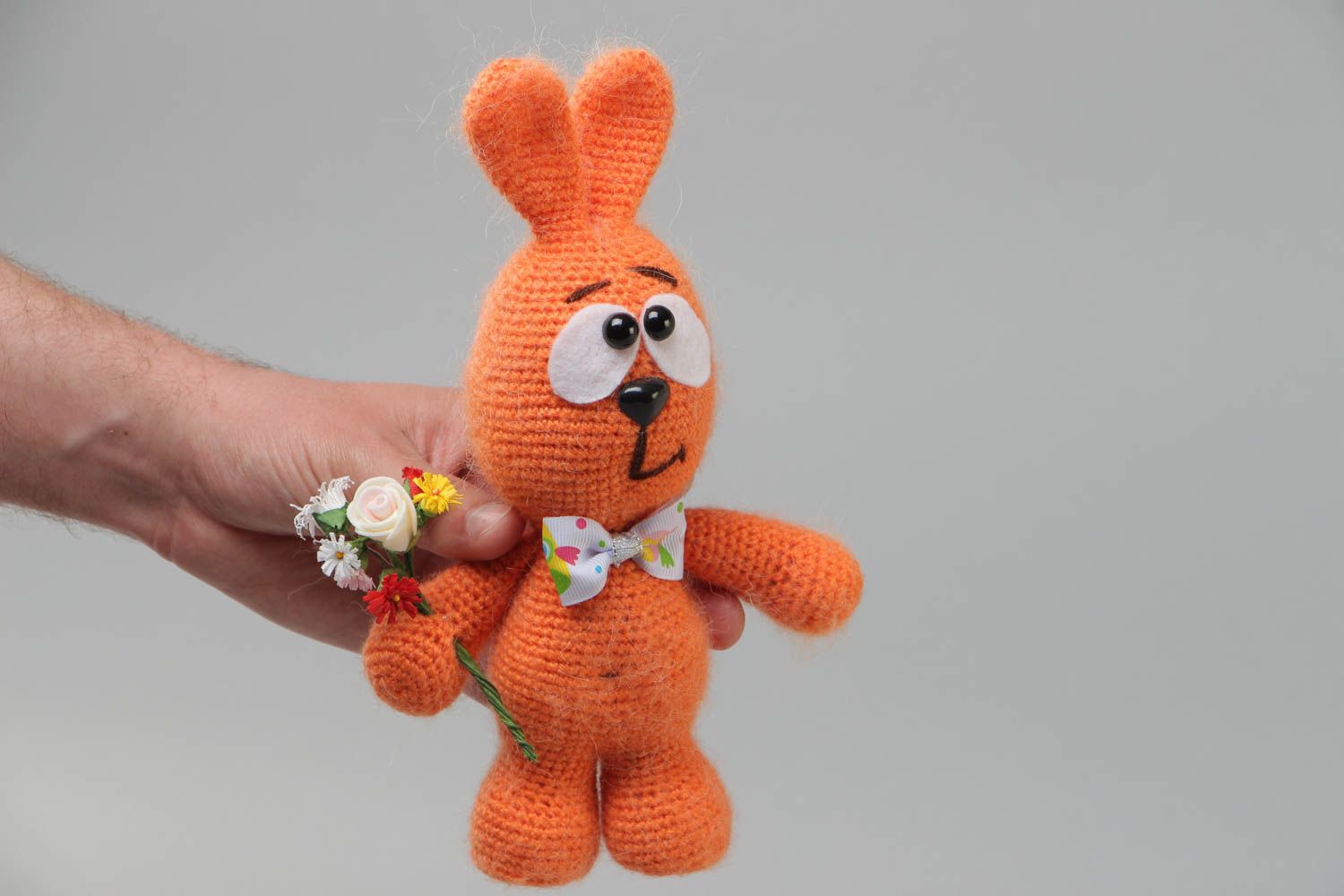 Handmade soft toy crocheted of acrylic threads Orange Rabbit with bouquet photo 5