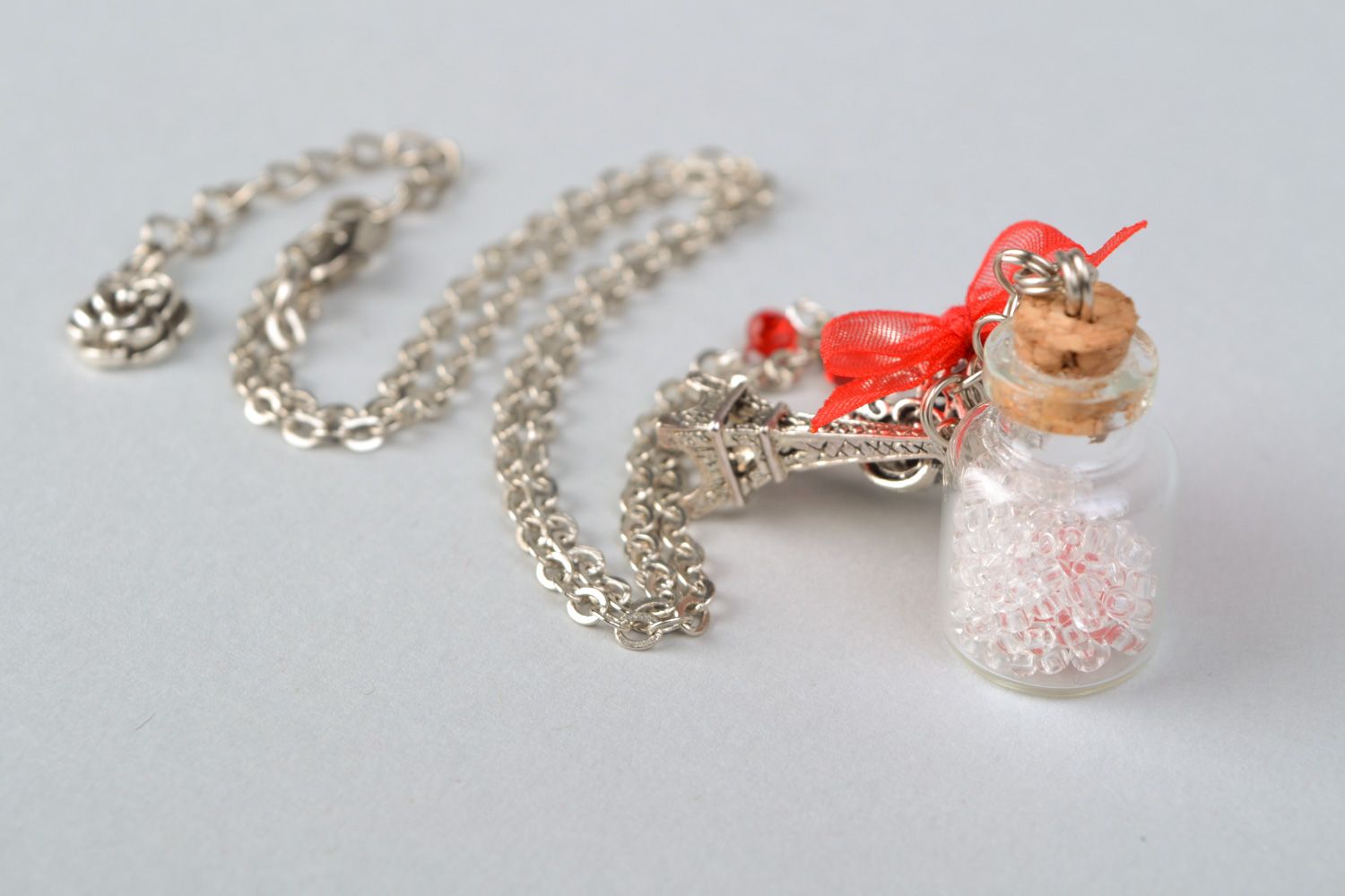 Handmade glass bottle pendant on long chain with metal charm for women photo 5