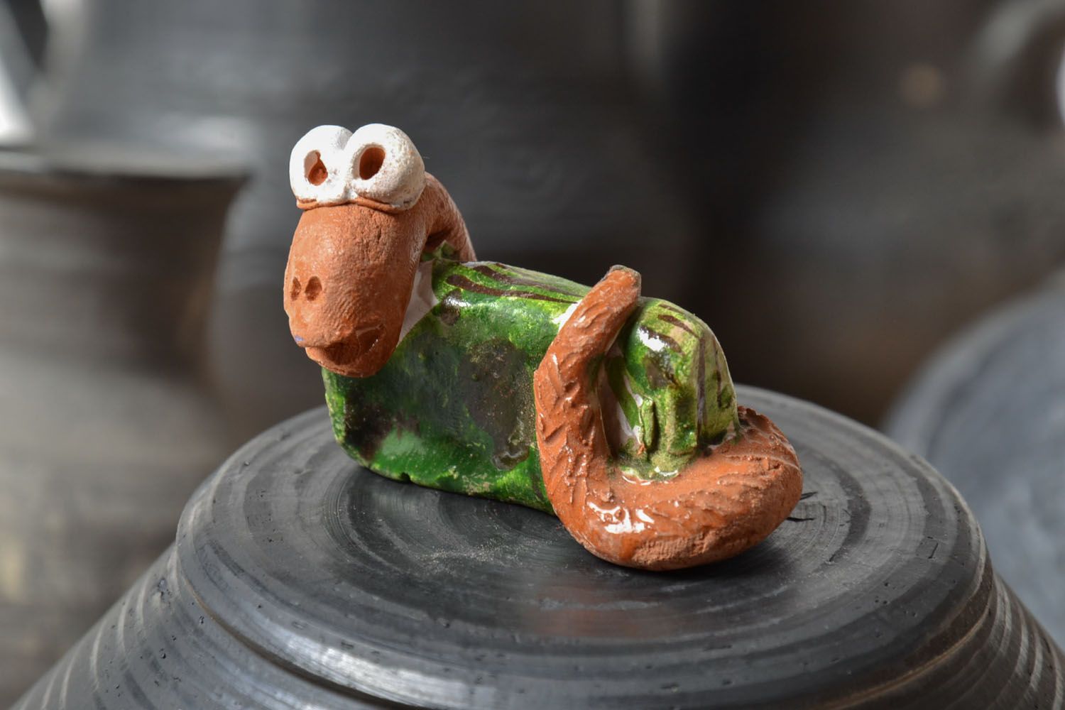 Clay figure of snake photo 1