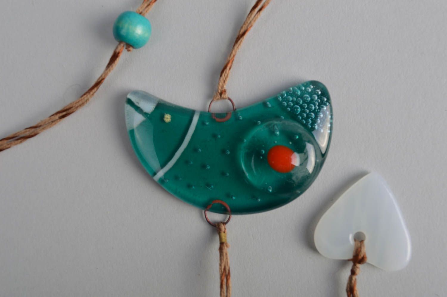 Handmade glass wall pendant in shape of bird made using fusing technique photo 3