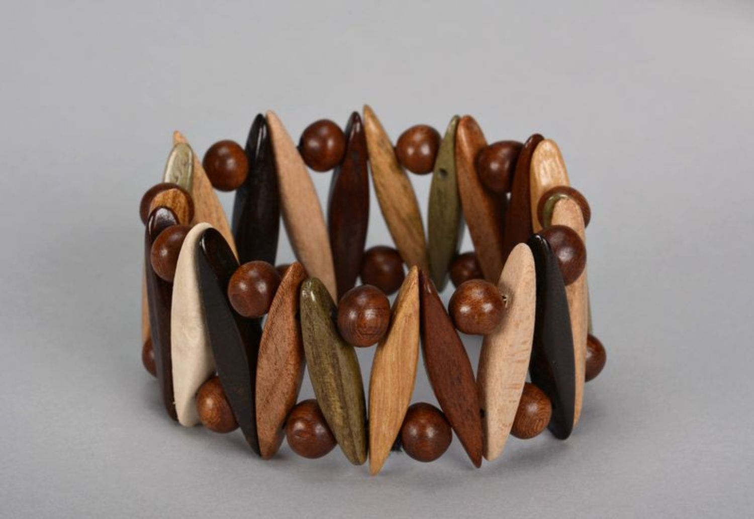 Brown wrist bracelet with round beads photo 1