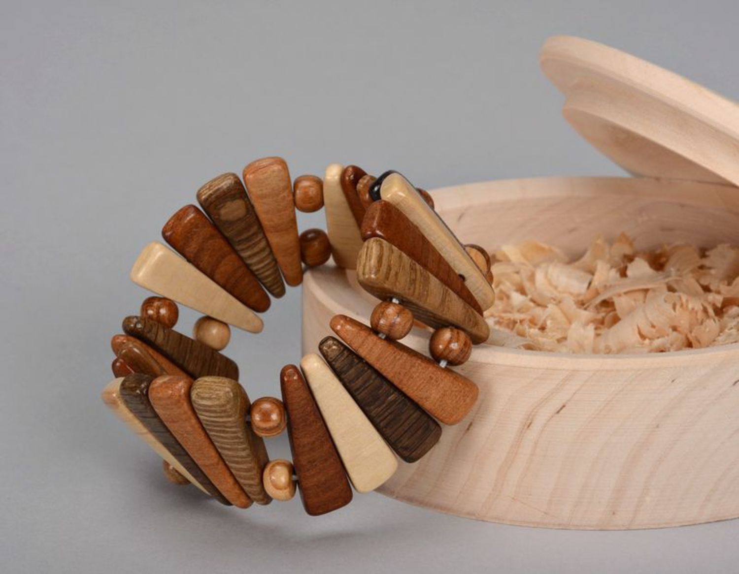 Fashionable wooden bracelet of brown color photo 2