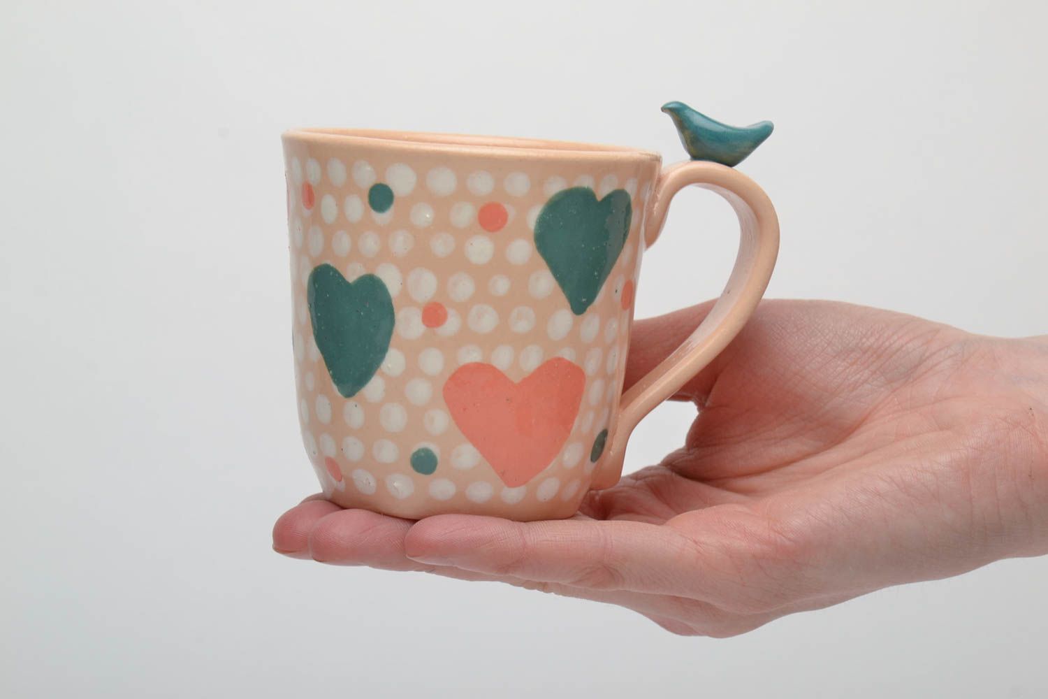 Peach color ceramic glazed teacup for a girl with a heart pattern photo 5